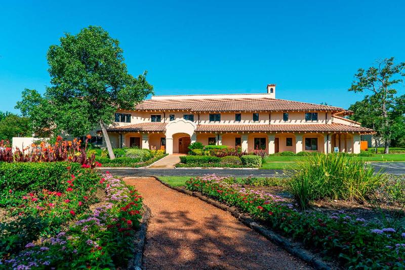The front facade welcomes you to your spiritual trips on a clear, sunny day at OHI Austin.