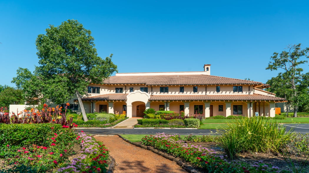 Beautiful view of the Optimum Health Institute in Austin, TX, a holistic healing center.